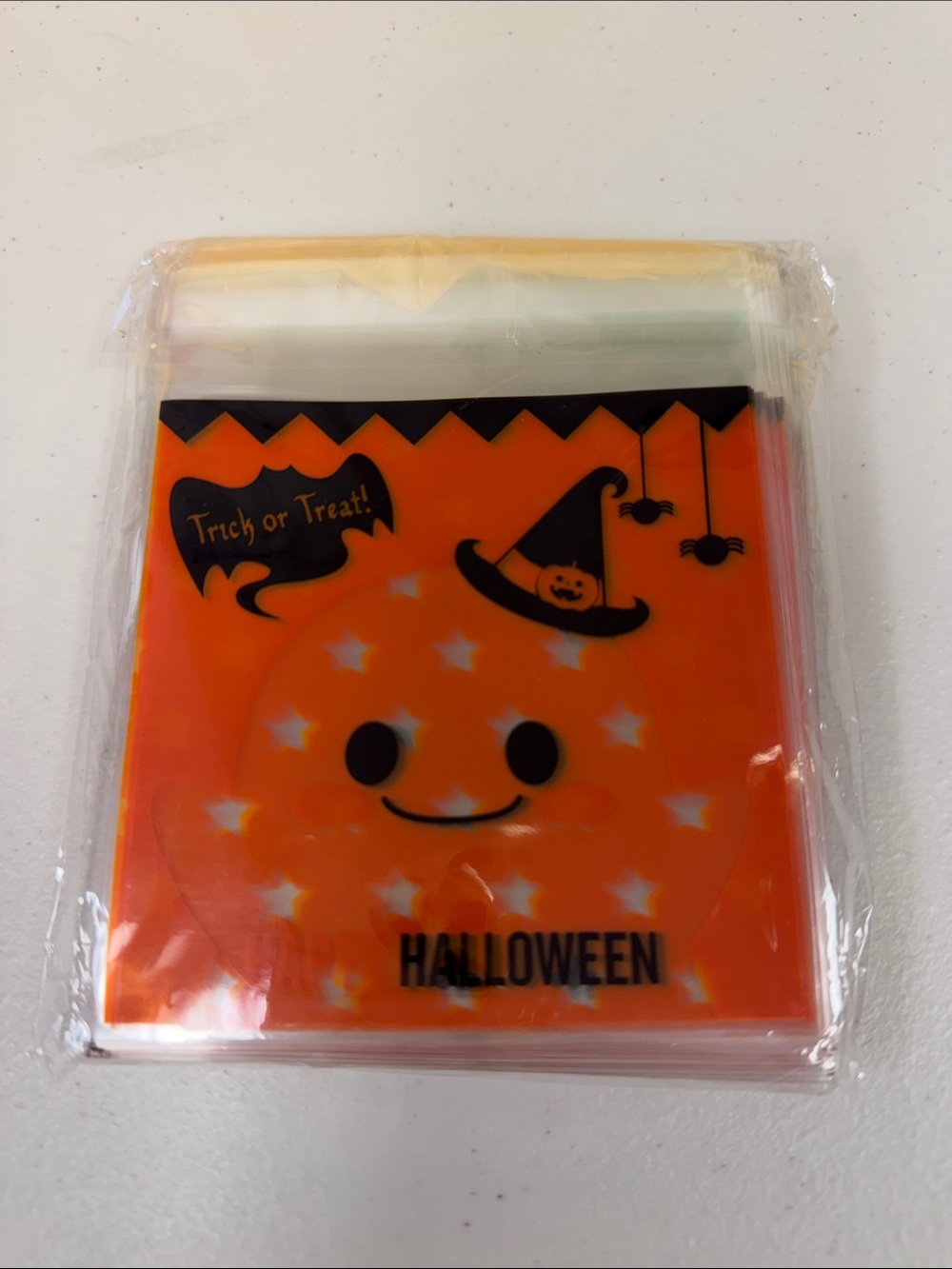 100 count Happy Halloween Treat Bags Orange Smiley Pumpkin Design trick or treat